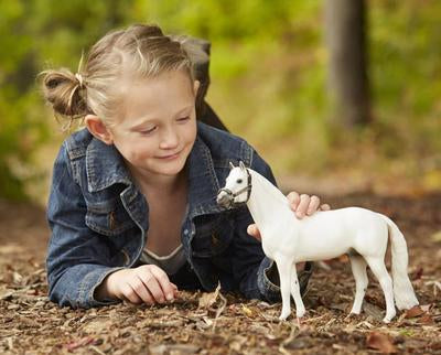 Little Girl with Snowman the Breyer horse.